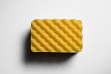 Yellow sponge for washing away dirt