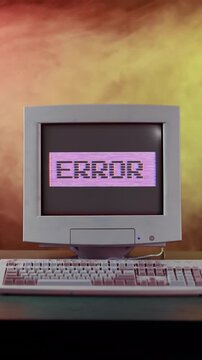 A vertical retro 1980s-style ERROR blinking stylized computer screen.  	