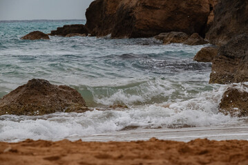 waves crashing on rocks