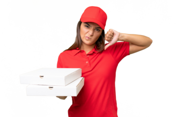 Pizza delivery caucasian woman with work uniform picking up pizza boxes isolated on green chroma background showing thumb down with negative expression