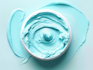 Fototapeta premium Light blue cream tub with smooth texture on white backdrop