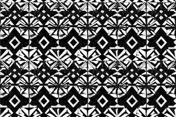 Fototapeta premium Artisanal Shibori pattern in high-contrast black and white on a textured surface