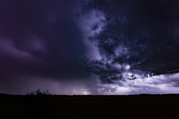 lightning flashes in the night sky