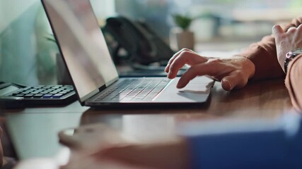 Two professionals hands typing on laptops at office closeup. Unknown managers