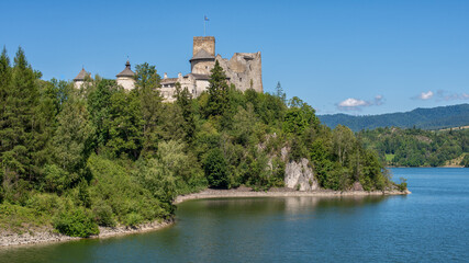 Panoramic view of Niedzica Castle perched on a limestone hill above the Czorsztynskie Lake, Poland, Europe