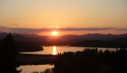 Obraz premium Sunset over mountains and lake.