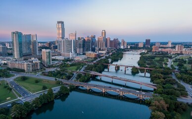 Bridges crossing the Colorado River and downtown Austin, Texas, United States.