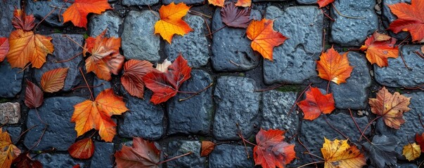 Autumn leaves on a cobblestone walk