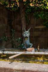 Images of Japan - Ryujin or Dragon God Supplying Purification Water at a Chozuya or Shinto Water...