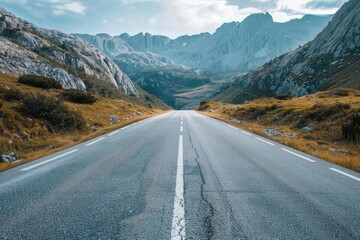 Fototapeta premium Empty road with mountains in the background