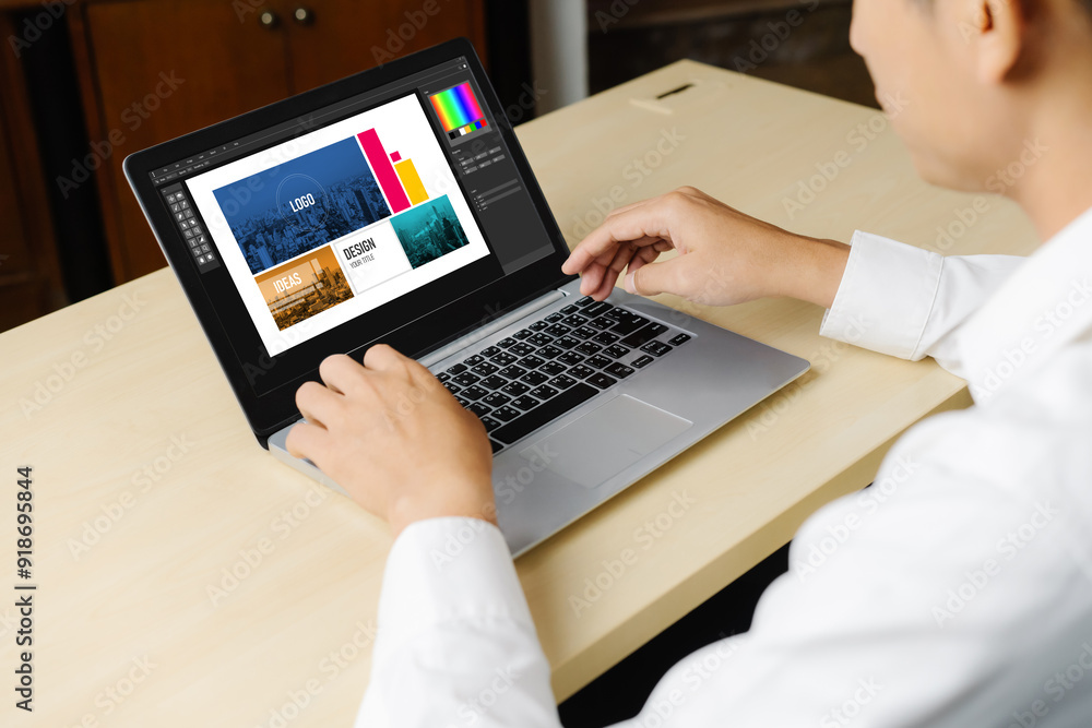 Poster graphic designer software for modern design of web page and commercial ads showing on the computer s
