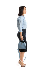 Mature woman in business attire with bag on white background