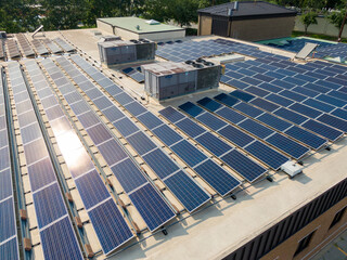 Daytime Drone Images of Roof Mounted Solar Panels on a Commercial Structure. Renewable, Energy,...