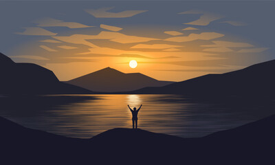 Beautiful view of lake at sunset with a man standing alone