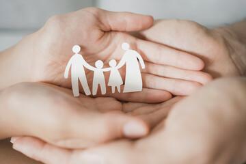 hands holding paper family cutout, foster care, homeless support, world mental health day, Autism...