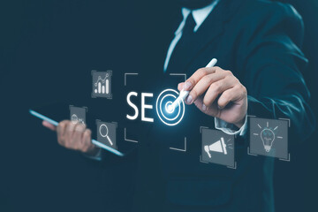 SEO Search Engine, Businessman use laptop to analyze SEO search engine optimization for promoting ranking traffic on website and optimizing your website to rank in search engines. digital marketing.