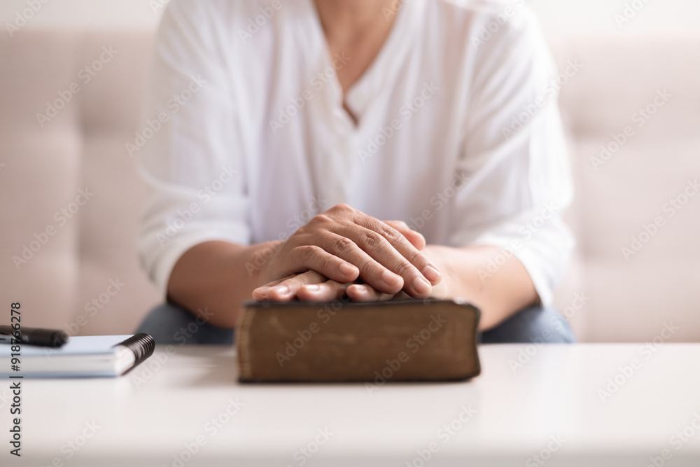 Poster christian woman with faith and hope, raises her hand in worship to pray to god and jesus christ, emb