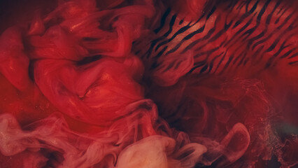 Mist floating. Paint water mix. Defocused red black silver color glitter particles texture underwater haze flow on zebra pattern abstract art background. © Photodrive