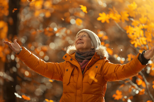  Active senior woman enjoying remarkable physical fitness on beautiful autumn day outdoors