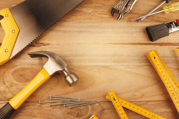 Work tools on wood background