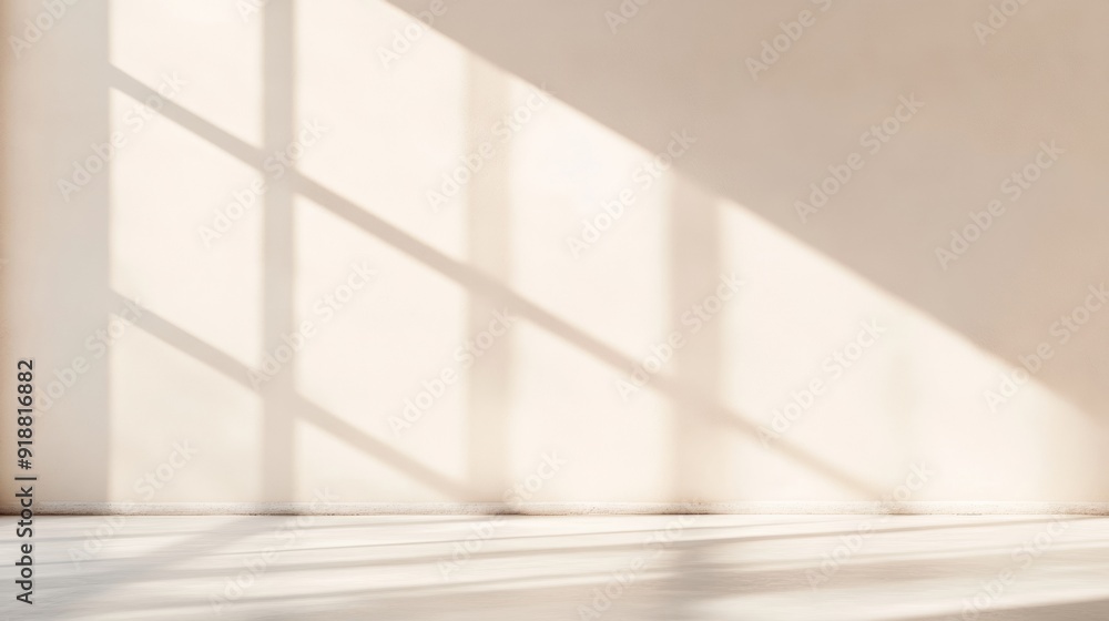 Poster beige urban flat wall with soft light beams casting shadows at sunset - calm and serene atmosphere i