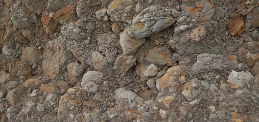 brown stone background. Rock surface. Mountain texture. Close-up. Bright rock background for your design.