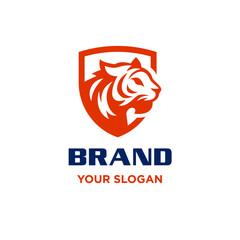 Roaring Tiger Head Logo Design Inside A Shield Secure Shape For Any Company