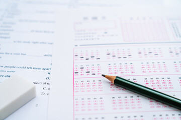 Chinese English Exam answer sheet and a pencil