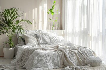 Comfortable bed with silky sheets in bright room