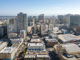 Fototapeta premium Drone photos over downtown Oakland California on a beautiful sunny day in August.