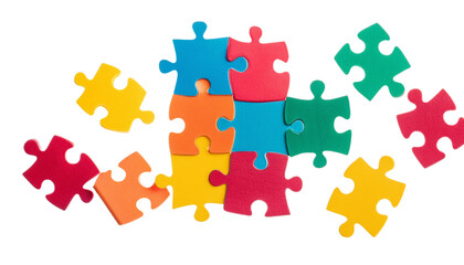 Colorful puzzle pieces scattered on a white background, perfect for representing education, problem-solving, and teamwork concepts.