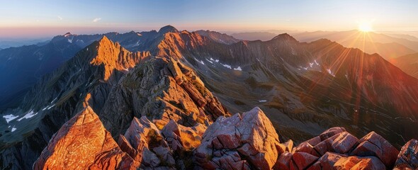Golden Hour Panorama of Majestic Mountain Peaks