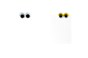 male and female eyes fridge magnet attached on note paper isolated on transparent, lover write...
