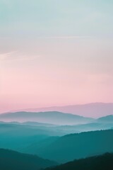 Fototapeta premium A beautiful mountain range landscape during sunset with warm colors and shadows