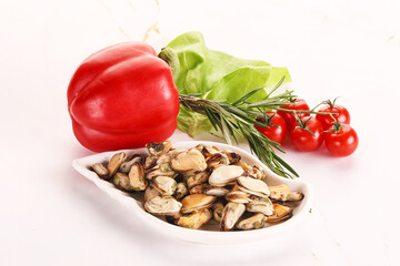 Marinated mussels in the bowl