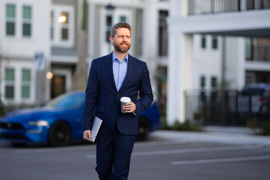 Business man in suit walk outdoor in street. Businessman in city. Business man in suit go to office work. Business people. 40s office worker. Outdoor portrait of businessman near office building.