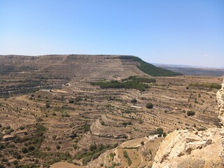 Ares del Maestre, a medieval village in the Province of Castellón, Spain, with a stone castle in ruins on a hilltop