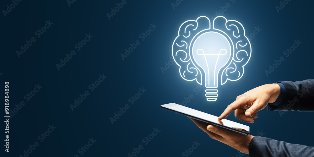 Poster close up of businessman hands holding cellphone with creative digital lamp hologram on dark backgrou