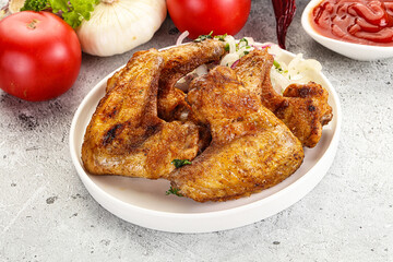 Grilled chicken wings with sauce