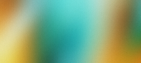 Abstract blurred background blending green yellow and blue colors with grainy texture