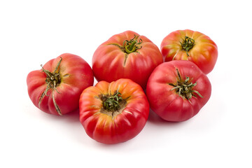 Fresh rustic tomatoes, isolated on white background.