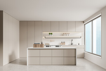 Beige home laundry interior with washing machine and cabinet, panoramic window