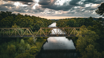 Fototapeta premium A old train bridge on a river