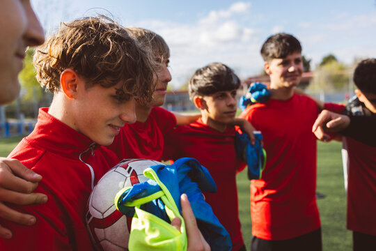 Soccer team preparing for match on field