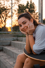 Relaxed Skateboarder Enjoying Sunset