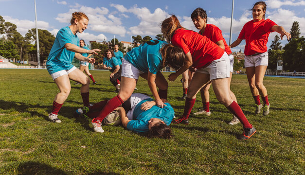 Rugby players having match on field