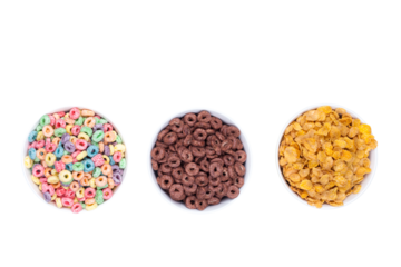 Three bowls of cereals on white background top view.