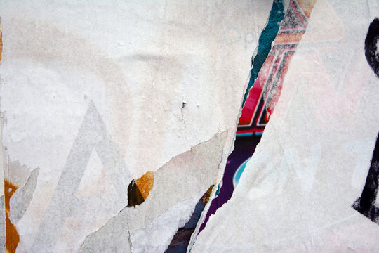 peeled posters on a wall background texture