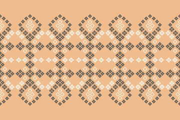 Traditional ethnic motifs ikat geometric fabric pattern cross stitch.Ikat embroidery Ethnic oriental Pixel brown cream label background. Abstract,vector,illustration. Texture,decoration,wallpaper.