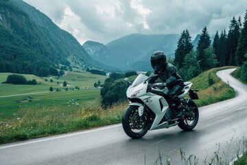 A person rides a motorcycle along a curvy road, with no traffic or obstacles in sight